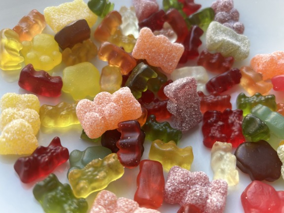 Sour and sweet gummy bear candies.